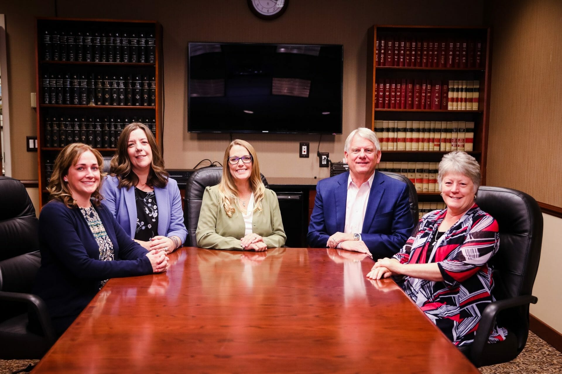 anderson-whitney-2021-11 anderson & whitney group photo in conference room